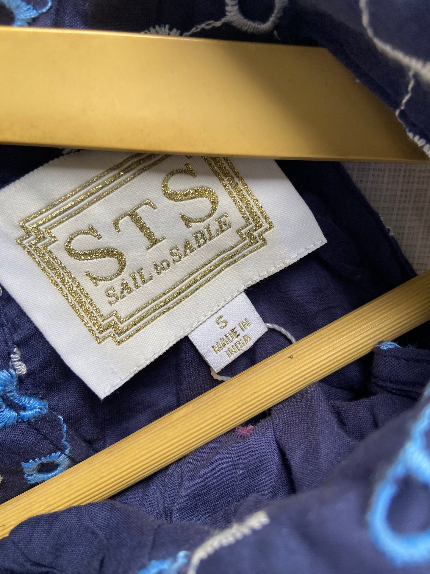 Elegant Blue Embroidered Sleeveless Top with Gold Buttons