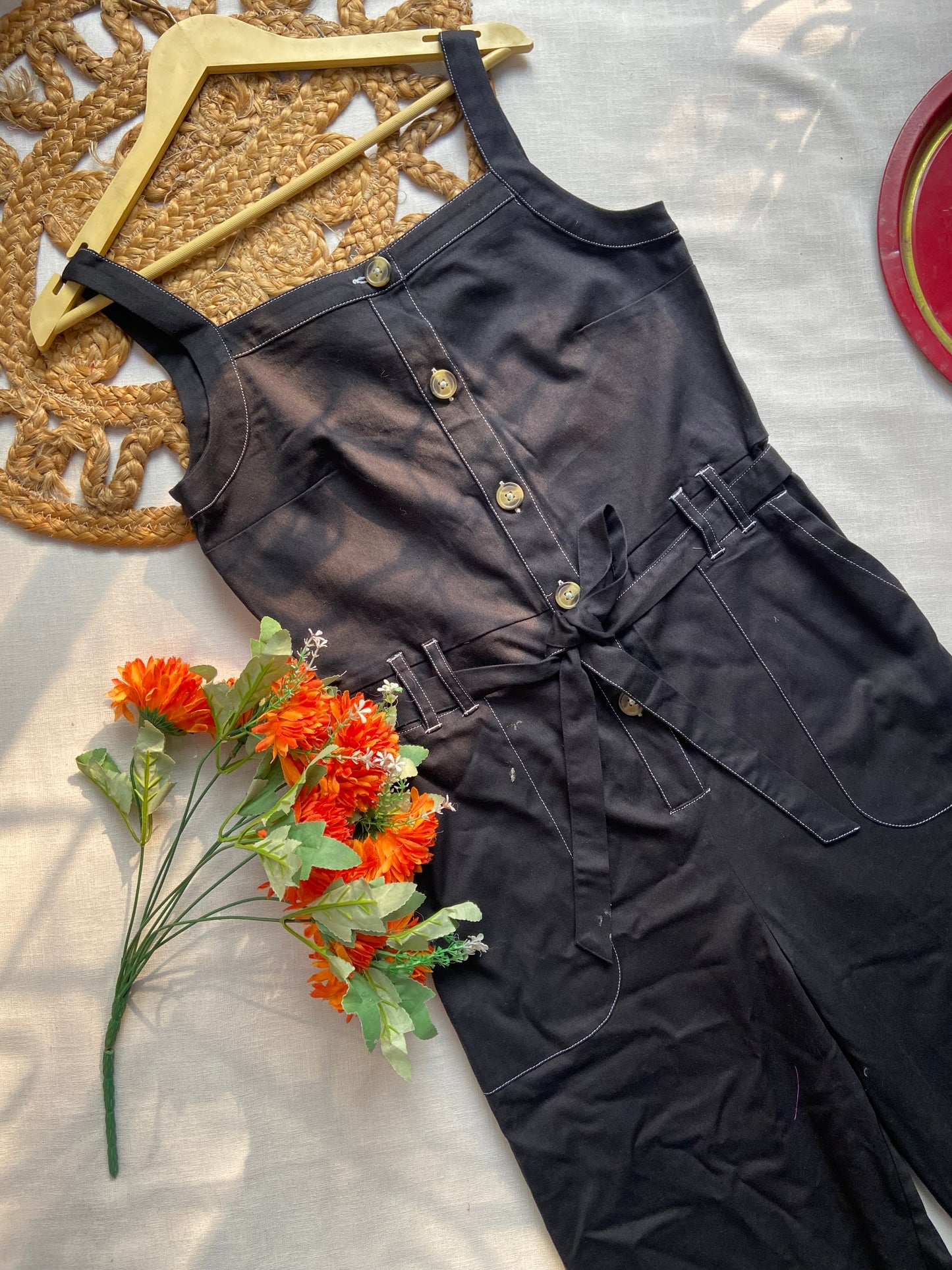Women’s Black Sleeveless Jumpsuit with Belt & Button Front
