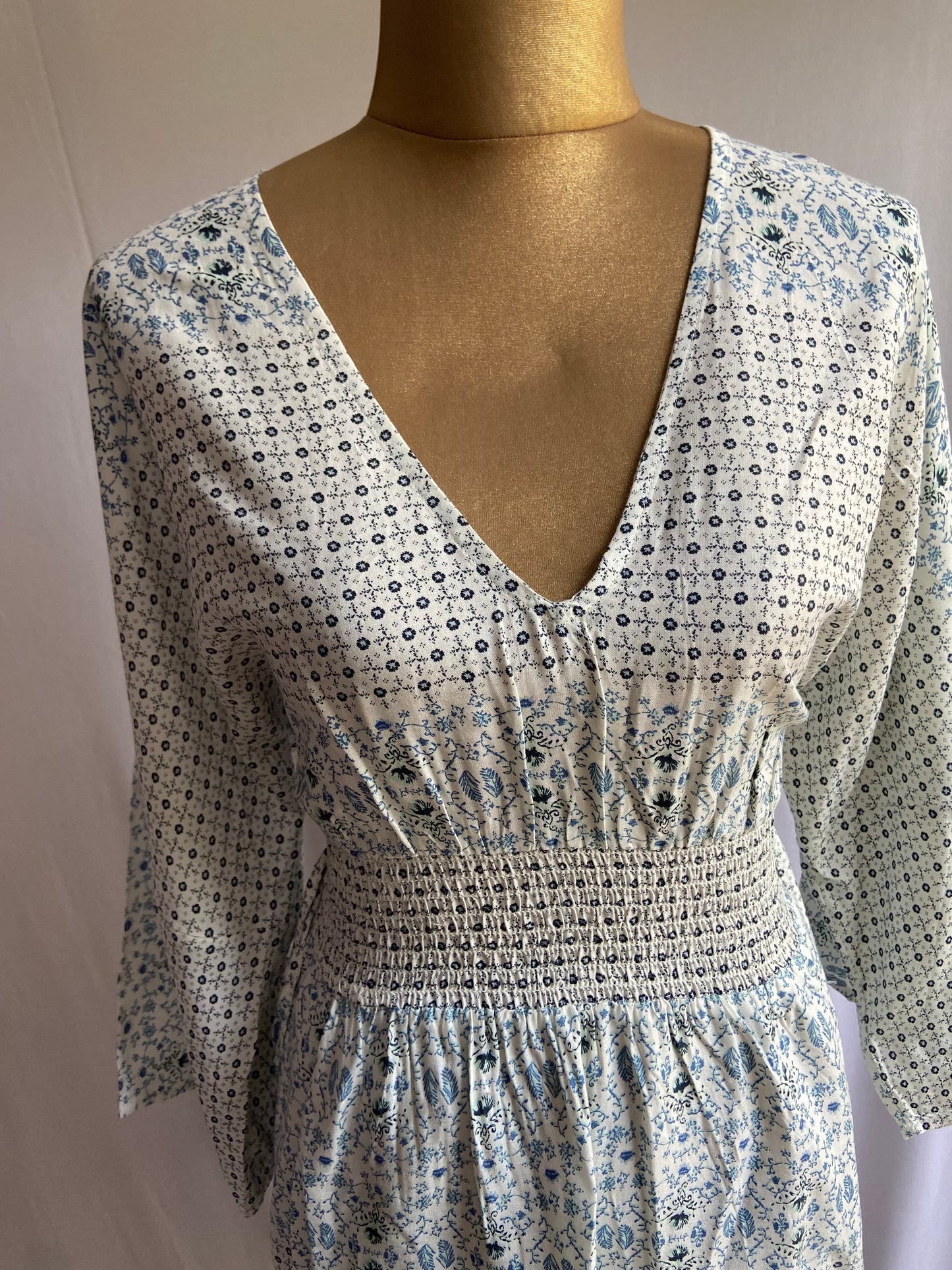 Boho-Inspired Printed V-Neck Dress with Smocked Waist and Flowy Sleeves