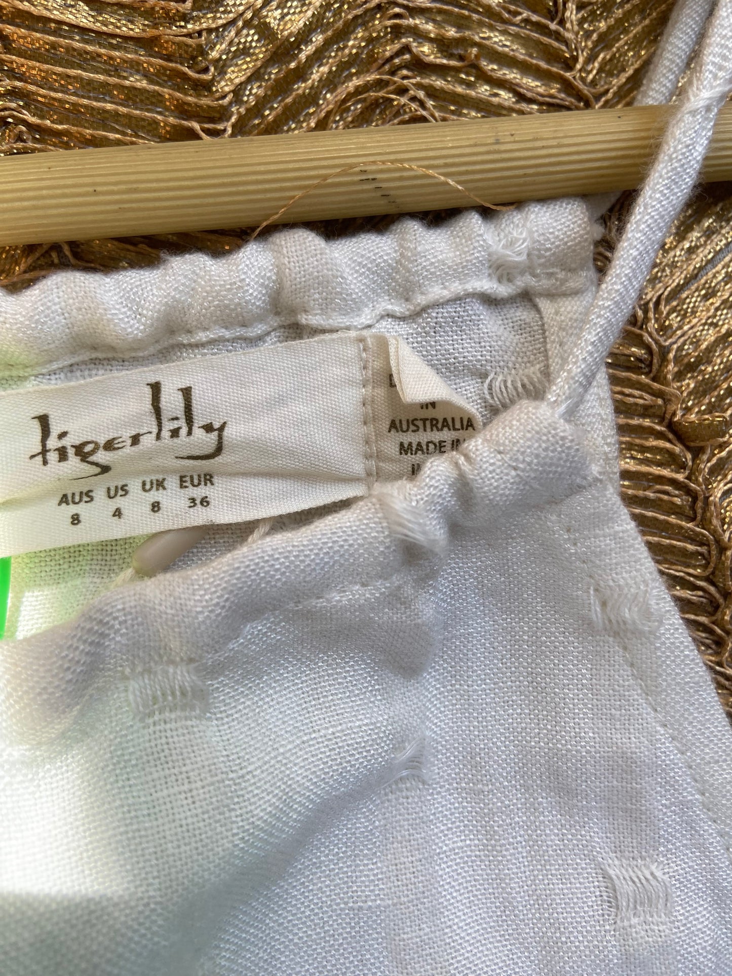 Off-White Ruffled Hem Sleeveless Cotton Dress