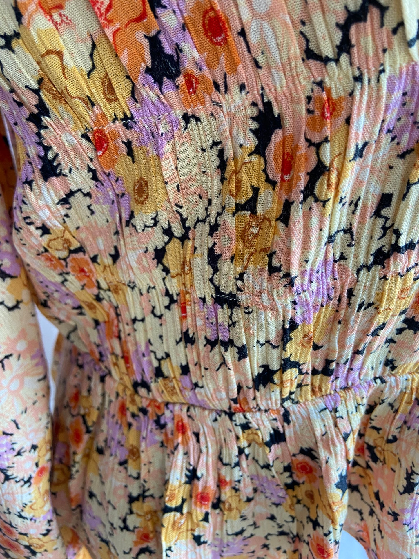 Floral Smocked Peplum Blouse with Deep V-Neck