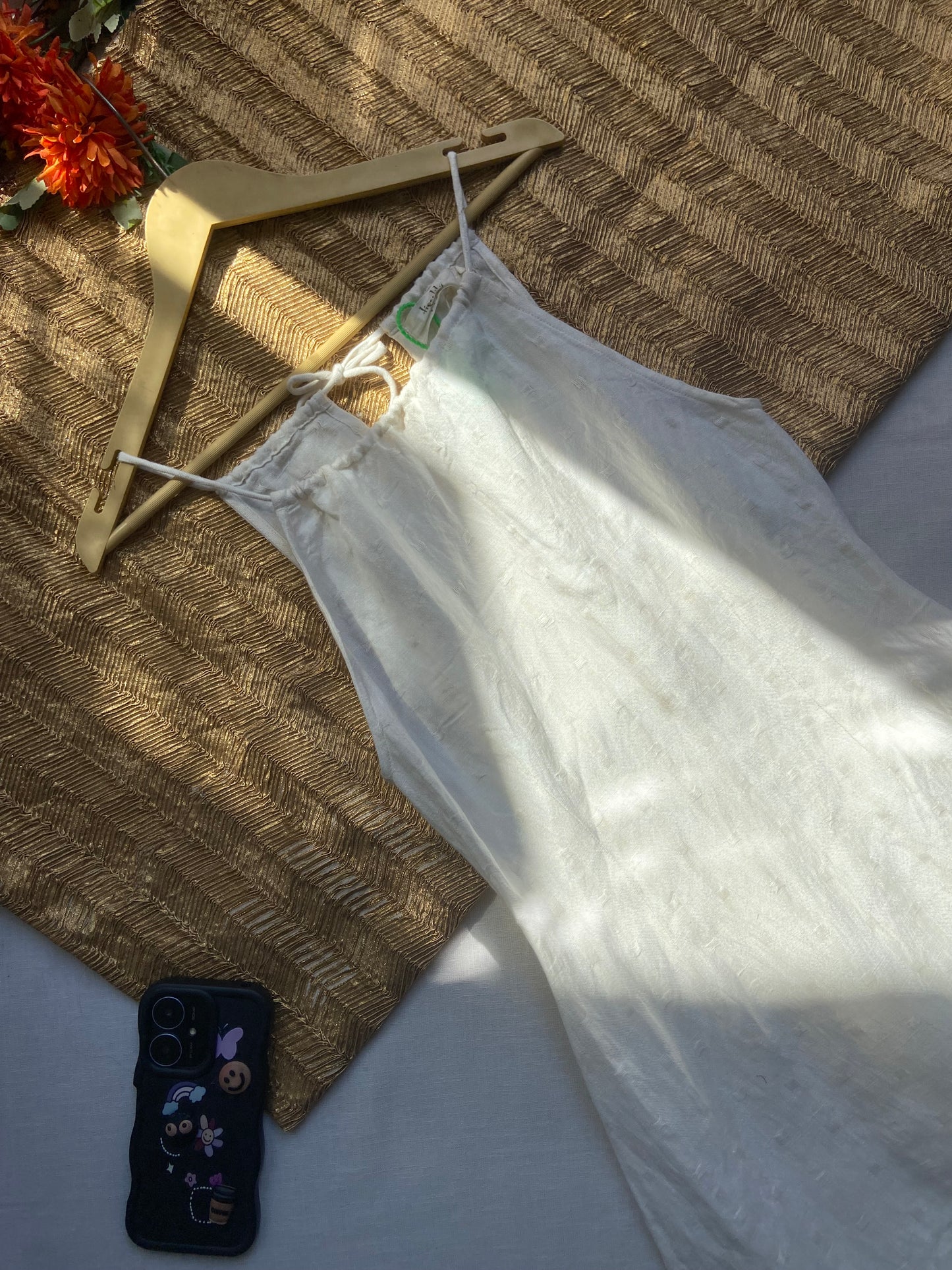 Off-White Ruffled Hem Sleeveless Cotton Dress