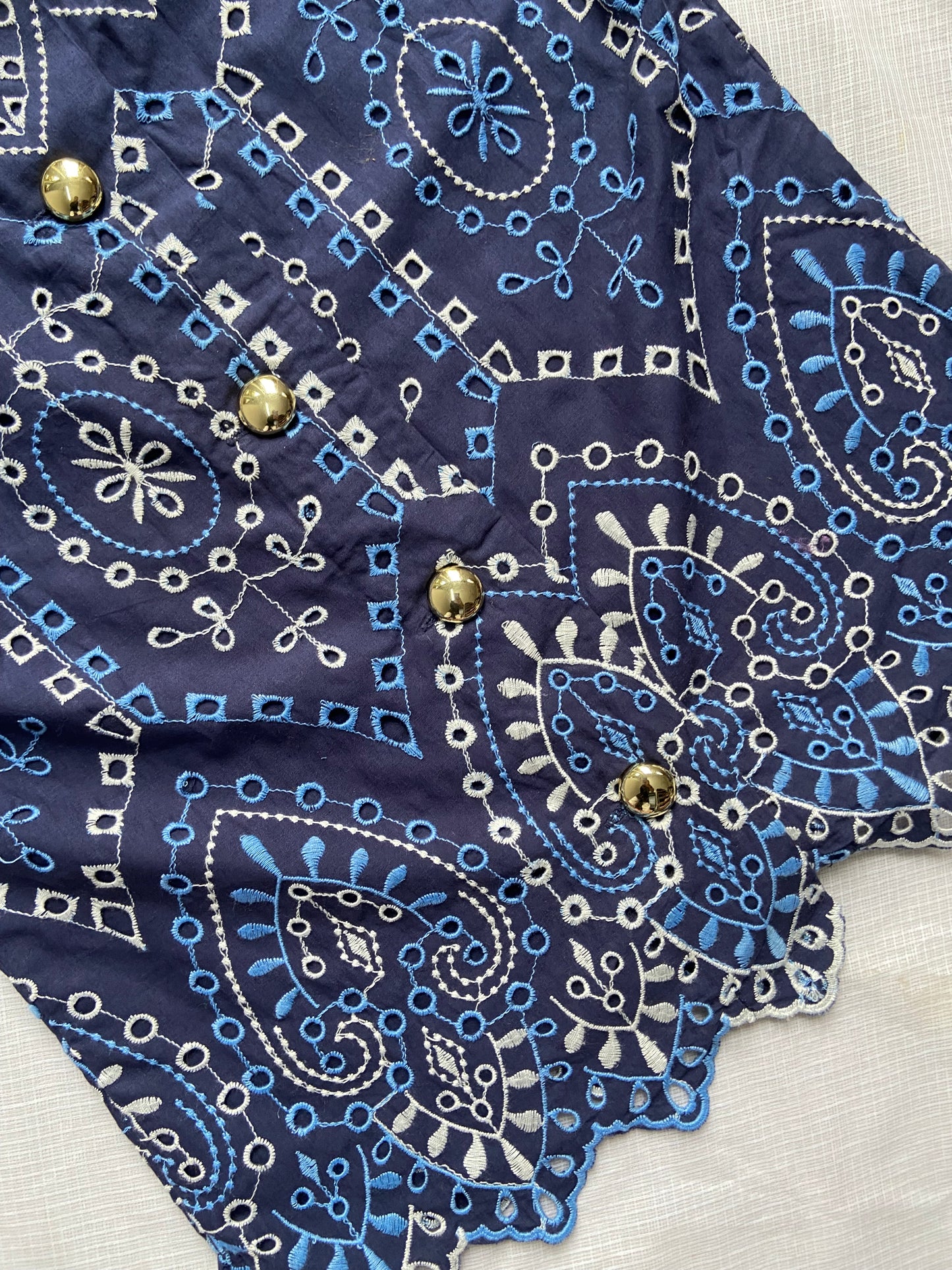 Elegant Blue Embroidered Sleeveless Top with Gold Buttons