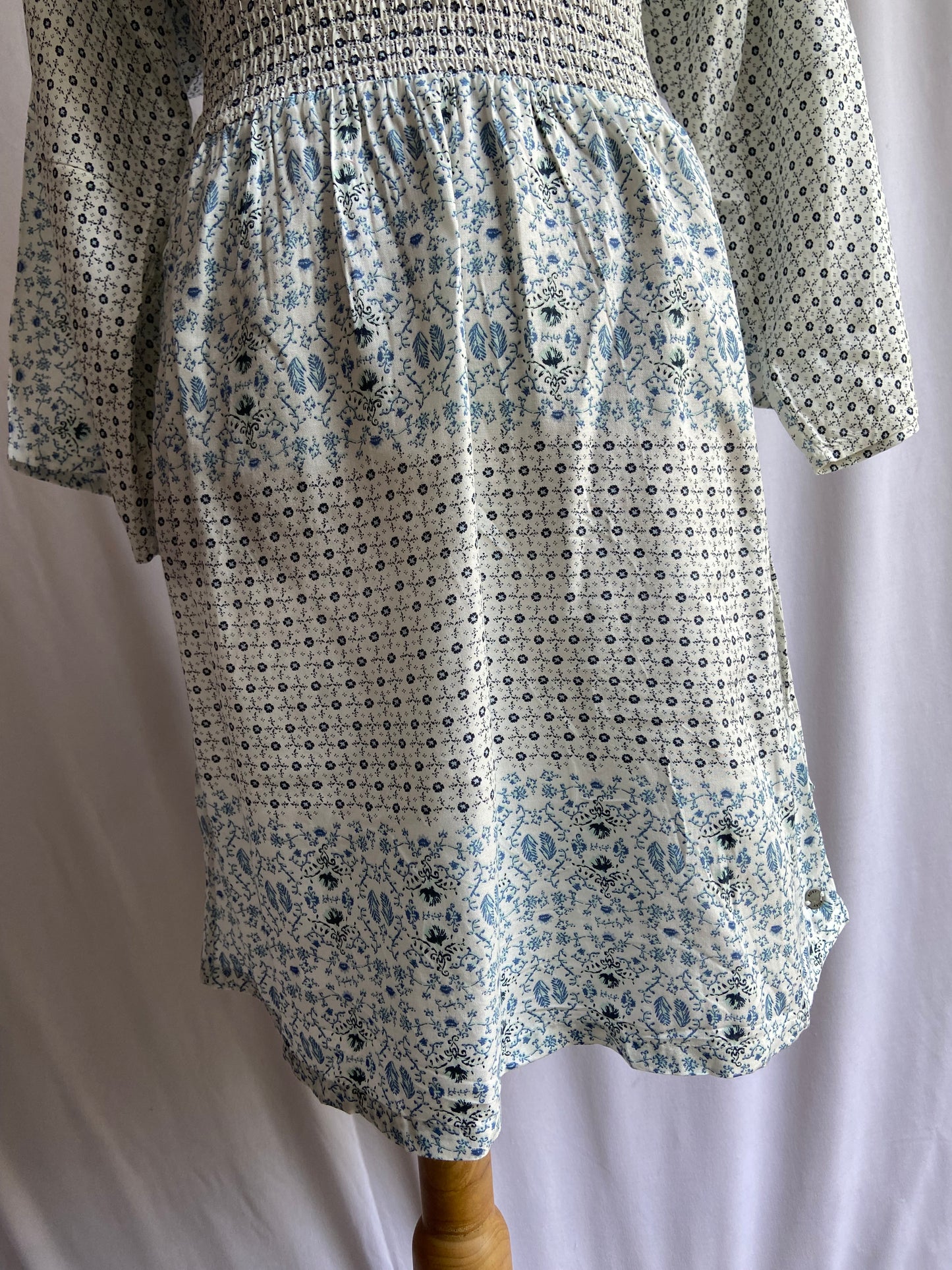 Boho-Inspired Printed V-Neck Dress with Smocked Waist and Flowy Sleeves