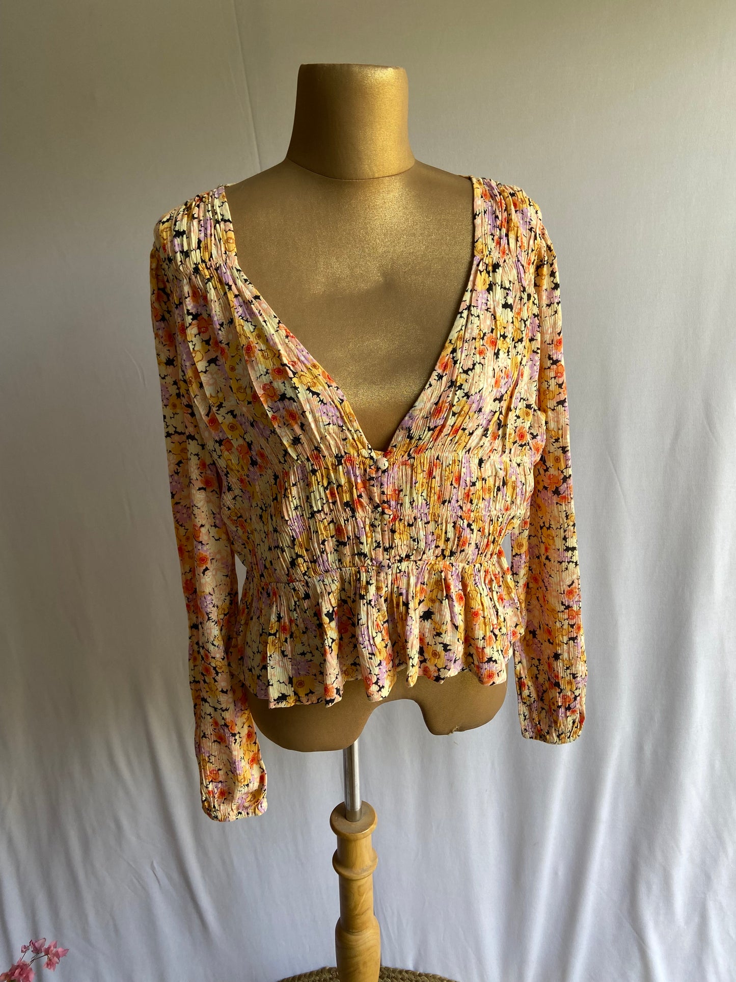 Floral Smocked Peplum Blouse with Deep V-Neck