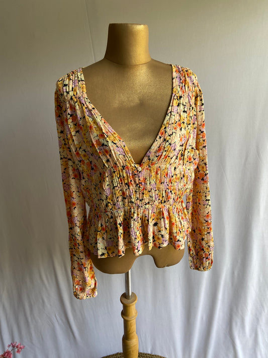 Floral Smocked Peplum Blouse with Deep V-Neck