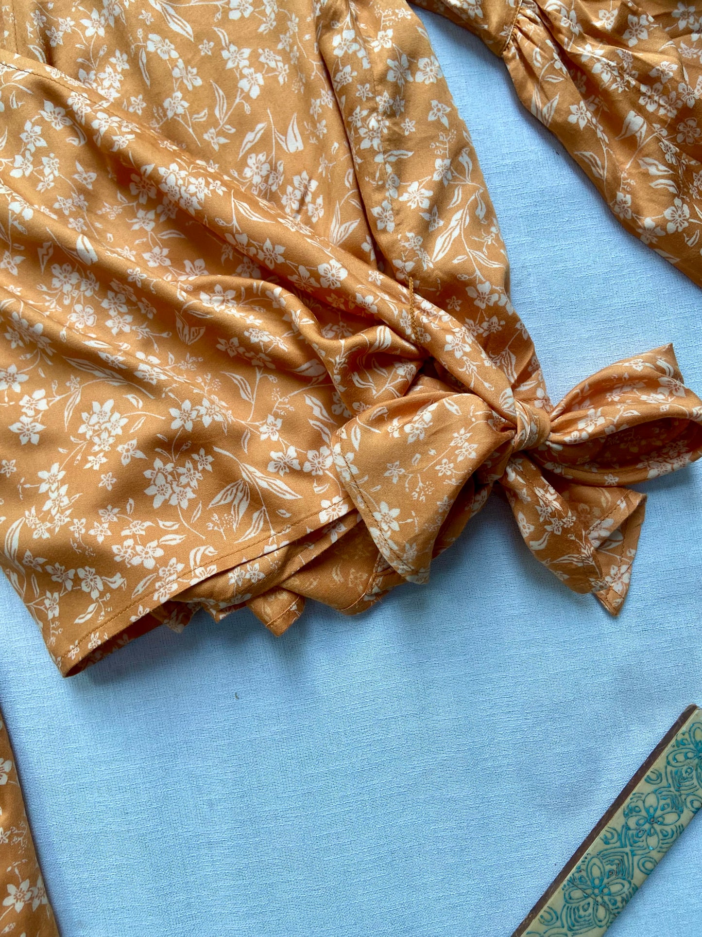 MUSTARD FLORAL WRAP TOP