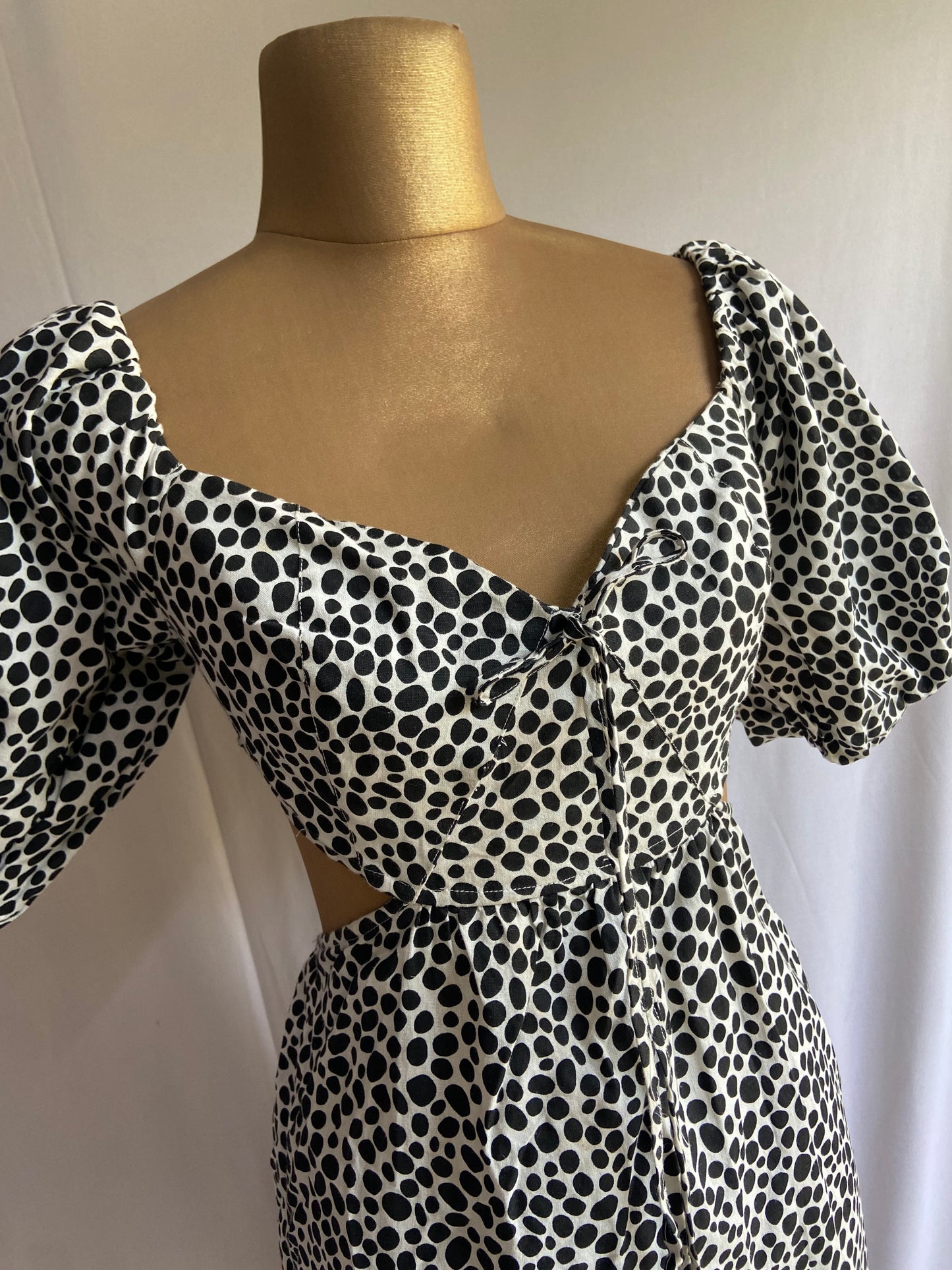 Polka Dot Puff Sleeve Dress with Front Cut-Out and Tiered Hem