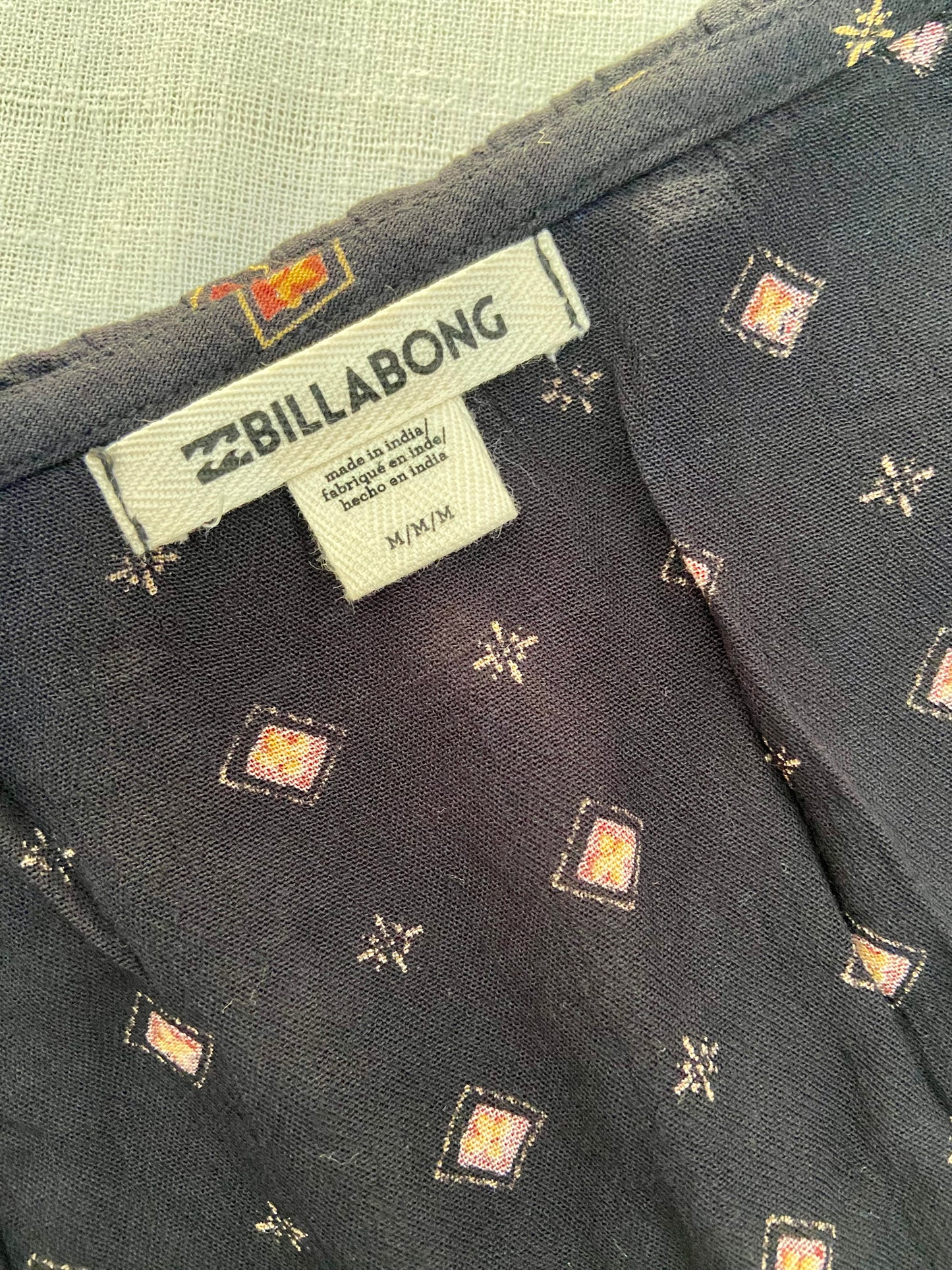 Vintage-Inspired Wrap Mini Dress with Geometric Print