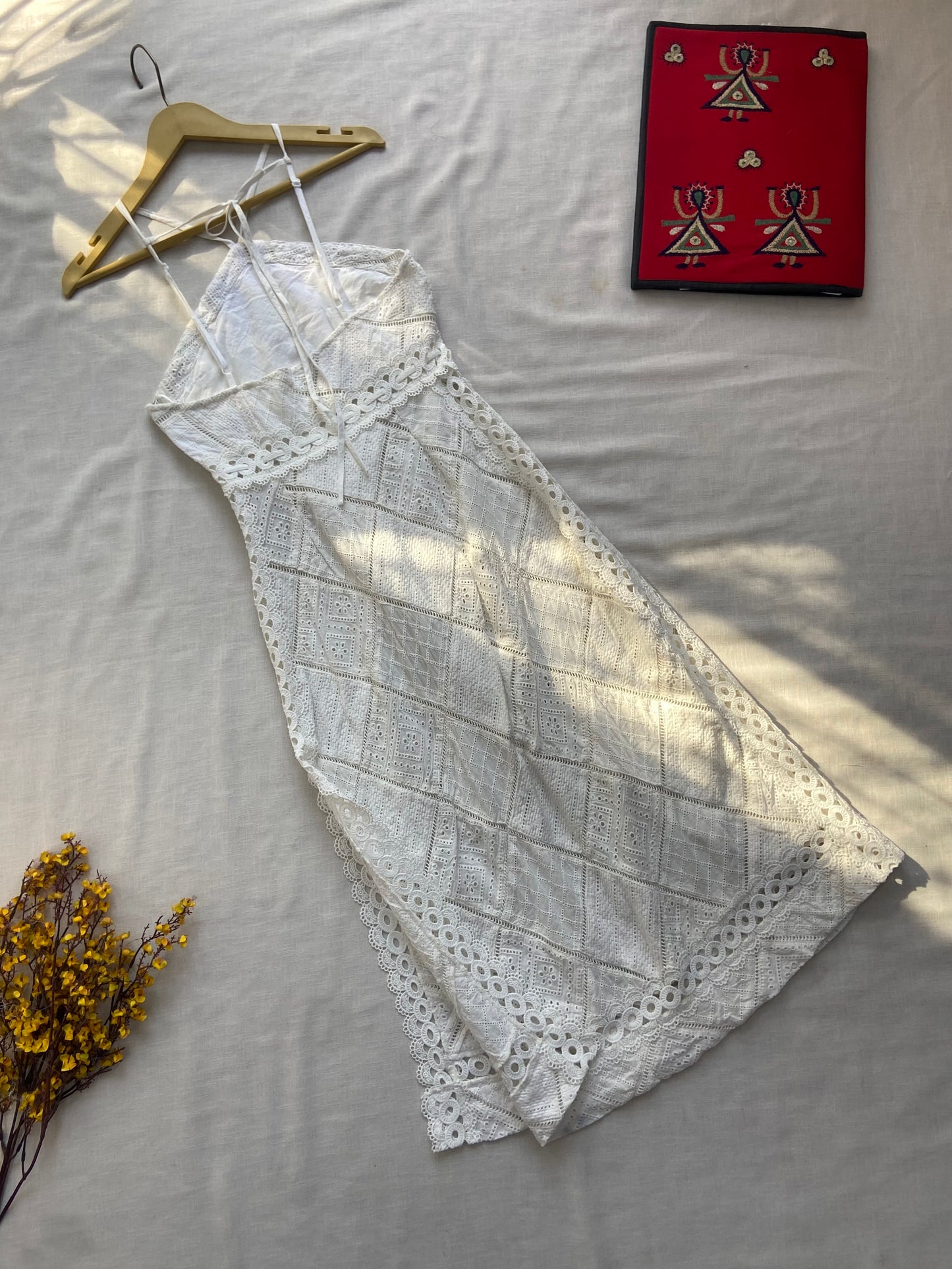 Elegant White Lace Midi Dress with Floral Detailing