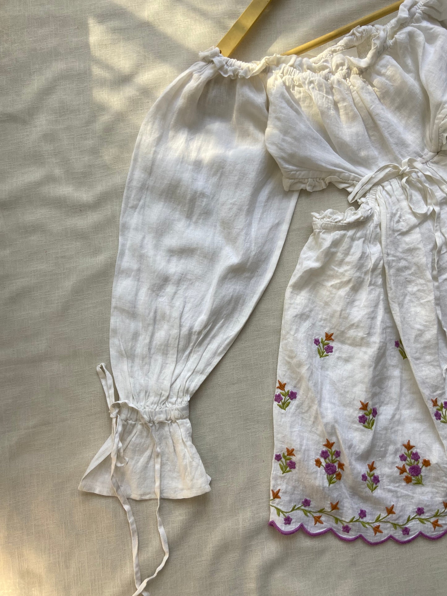 Elegant White Embroidered Peasant Top with Puff Sleeves