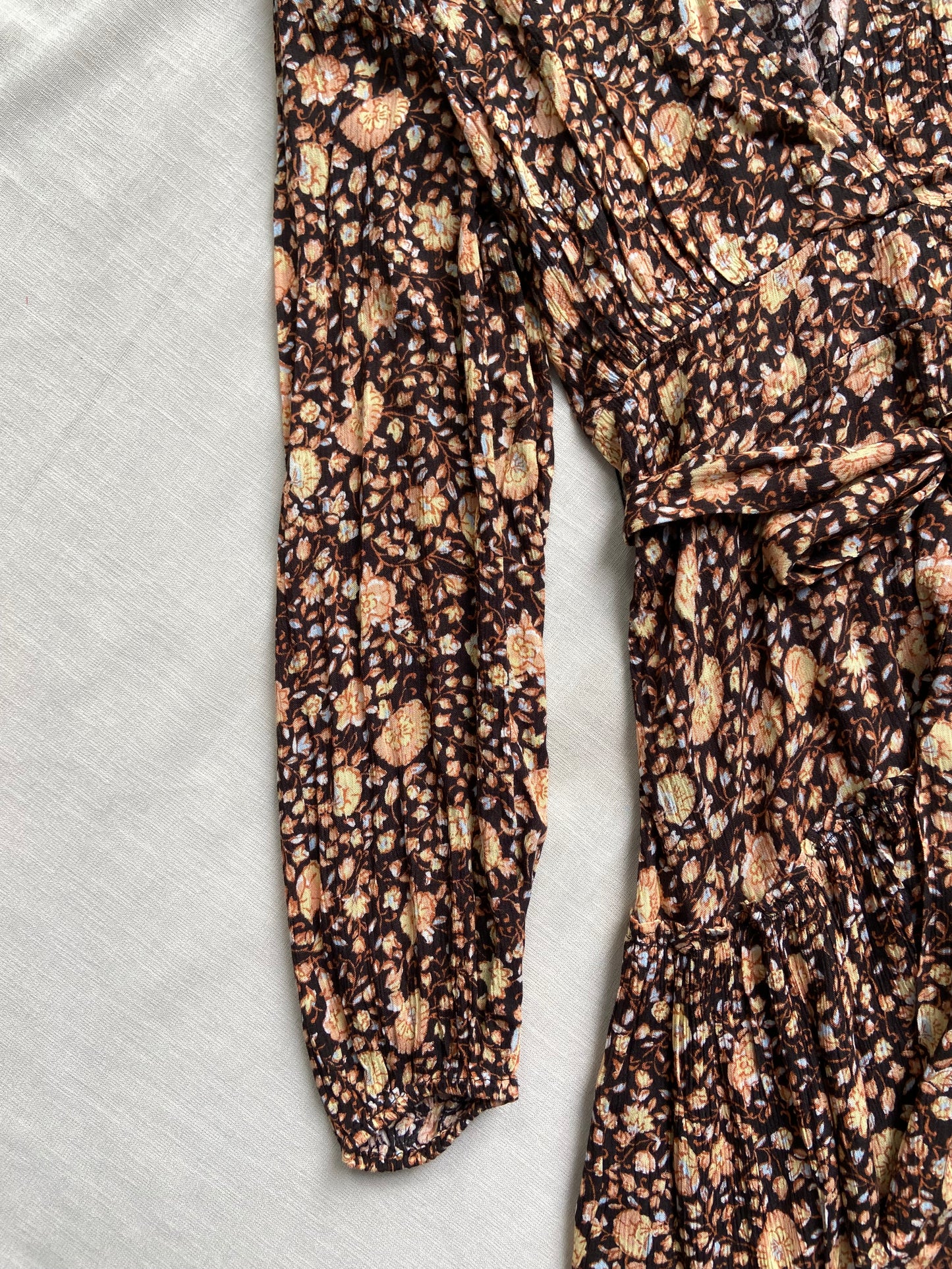 Brown floral wrap mini dress