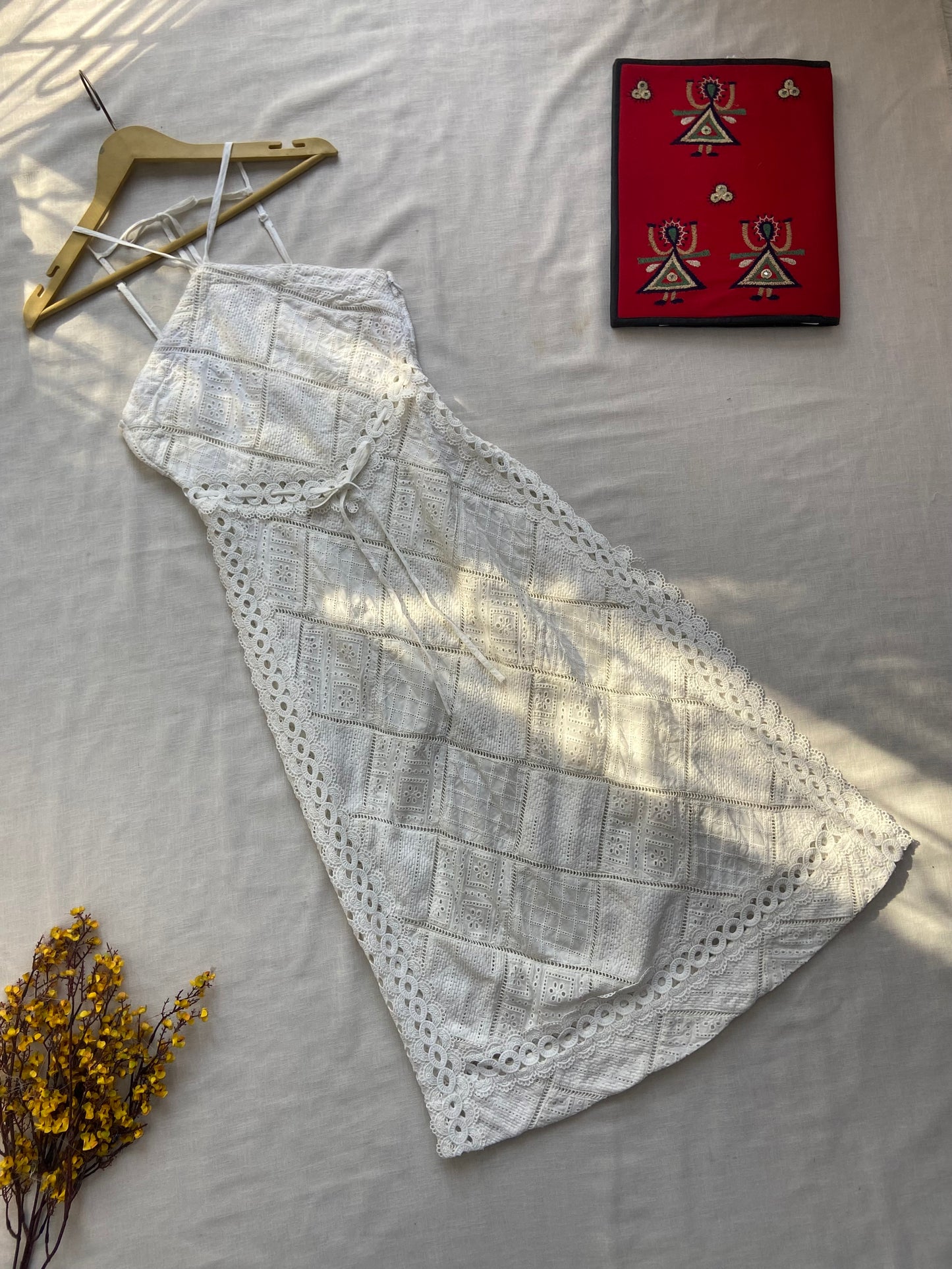 Elegant White Lace Midi Dress with Floral Detailing