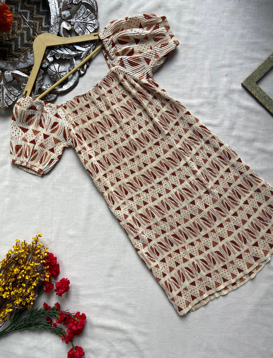 Pleated white printed dress