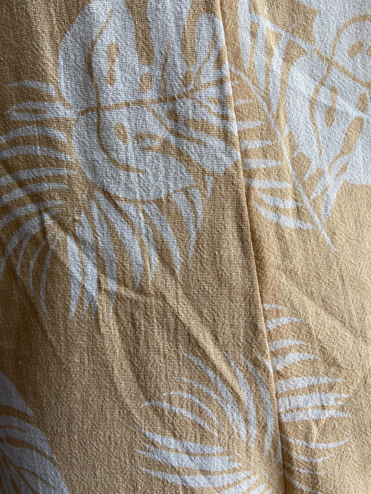 Elegant Yellow Leaf-Print Sleeveless Jumpsuit