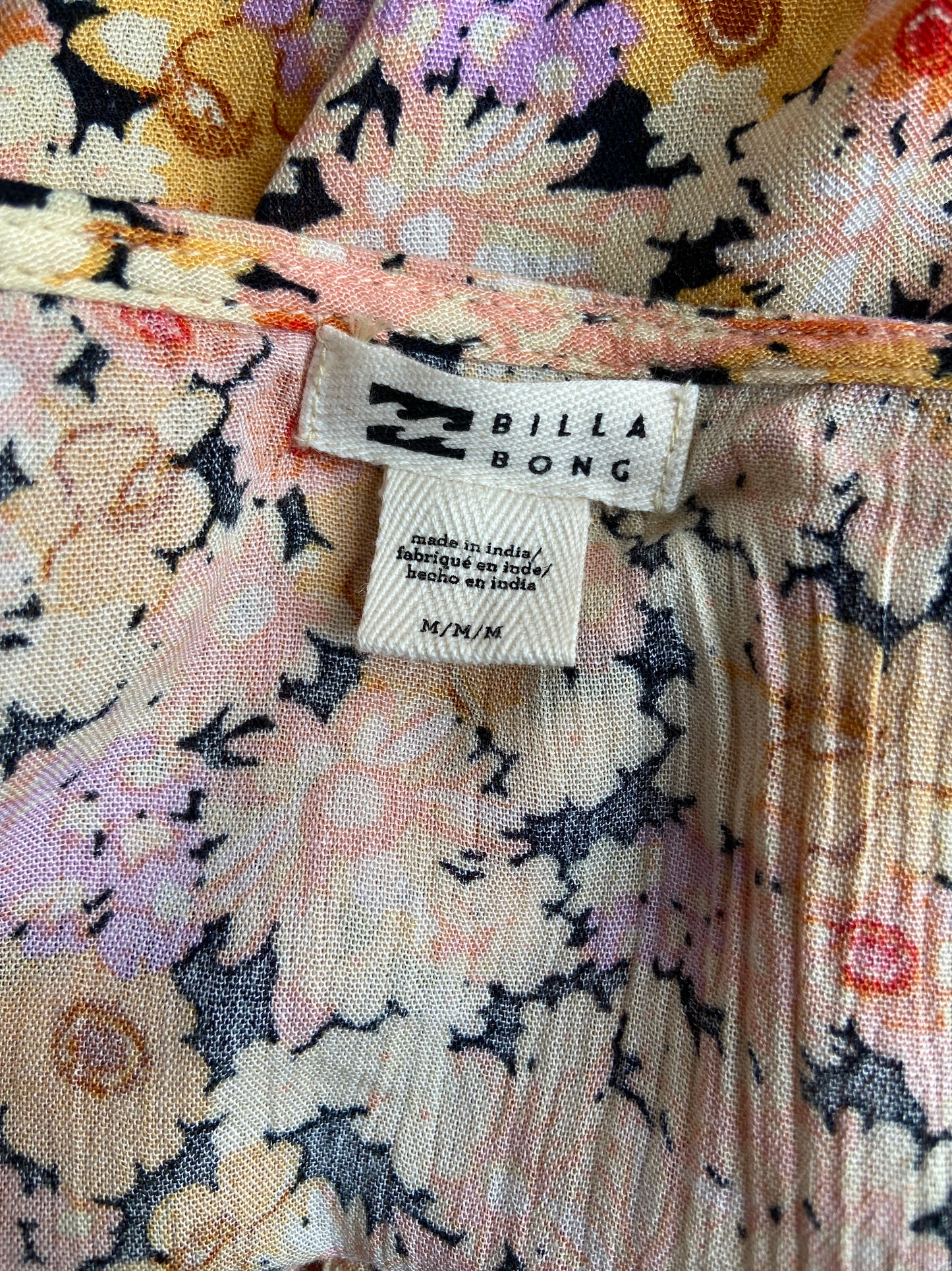 Floral Smocked Peplum Blouse with Deep V-Neck