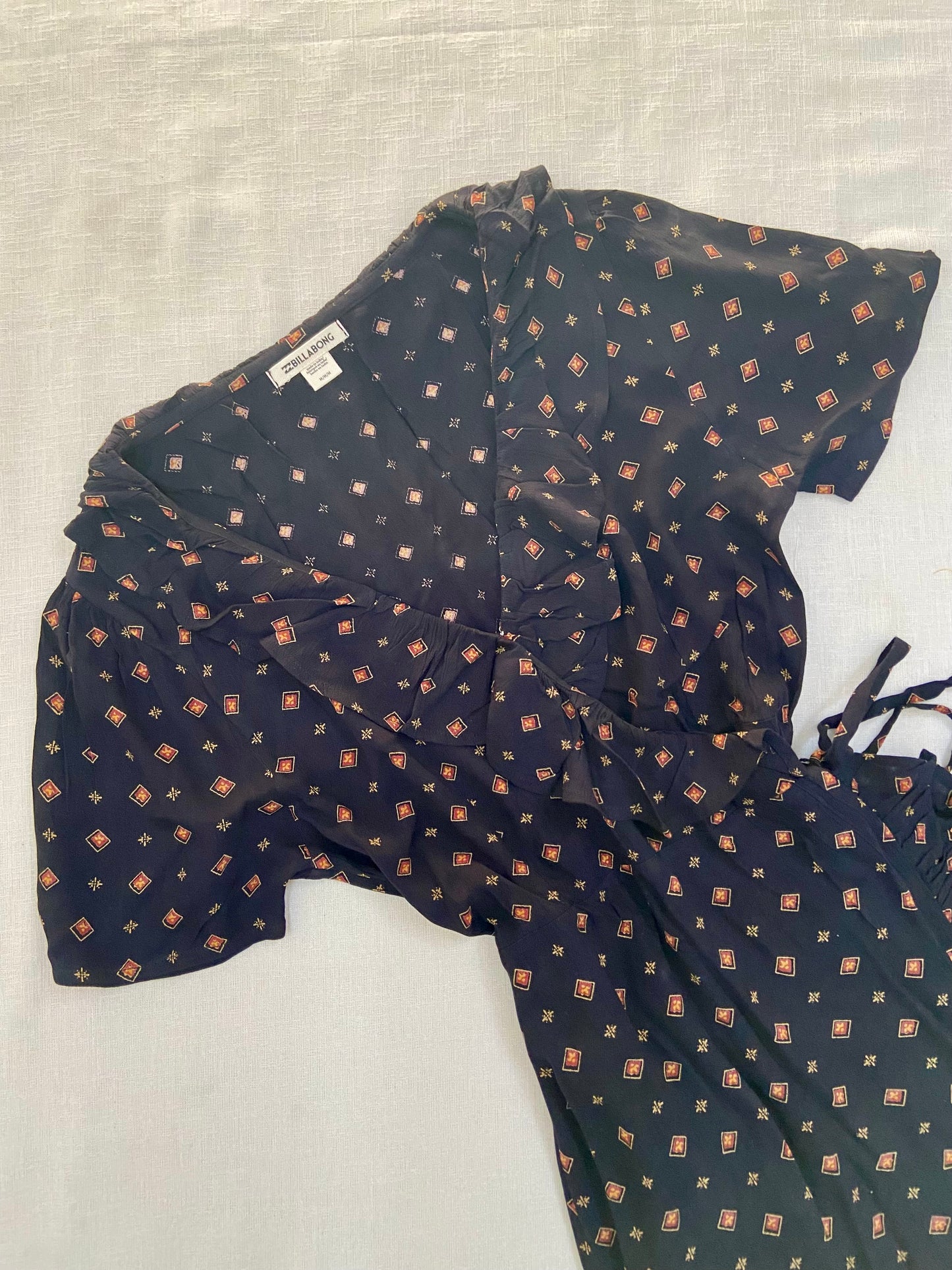 Vintage-Inspired Wrap Mini Dress with Geometric Print