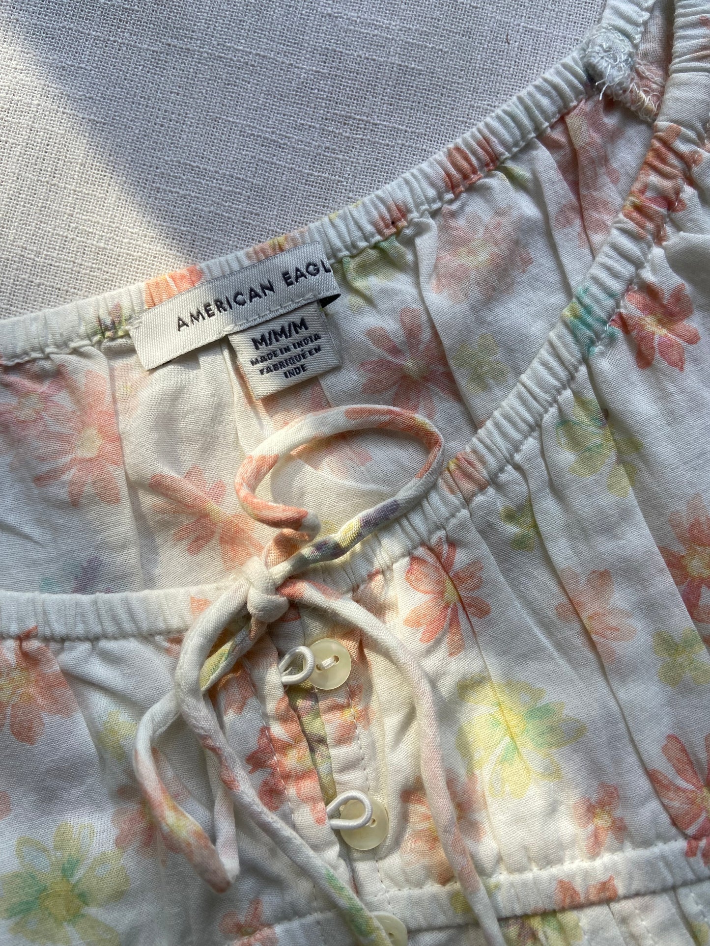 Floral Front-Tie Sleeveless Top – Pastel Peach