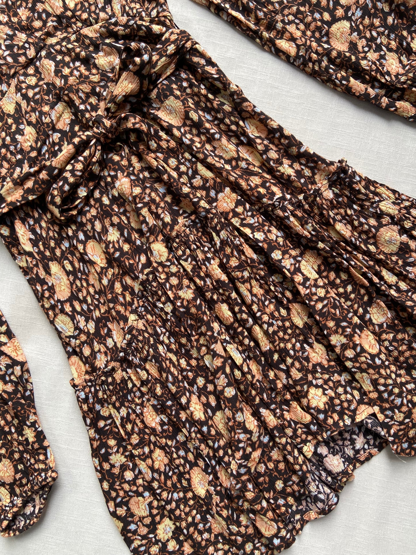 Brown floral wrap mini dress